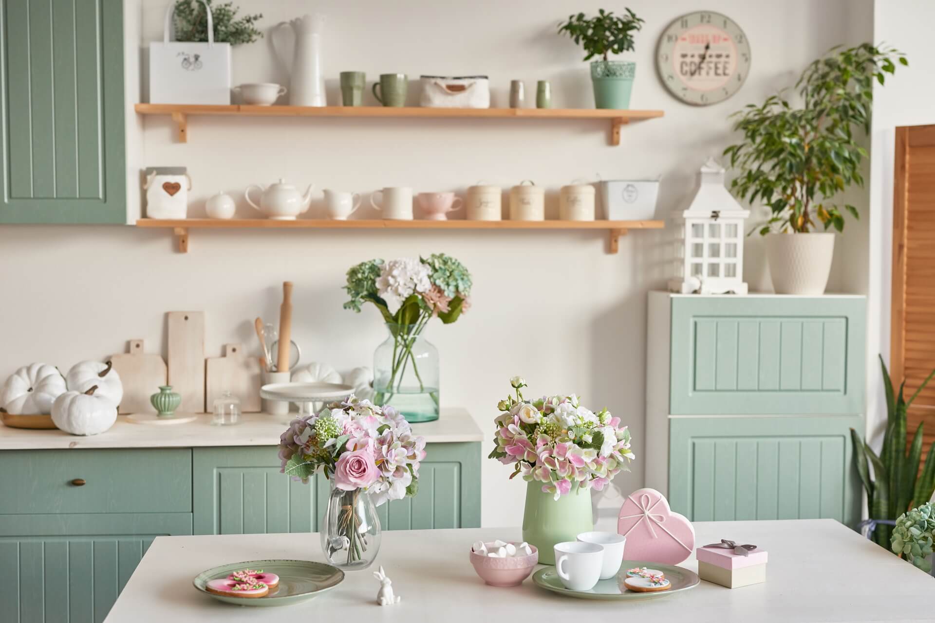 Kitchen with sage green cabinets