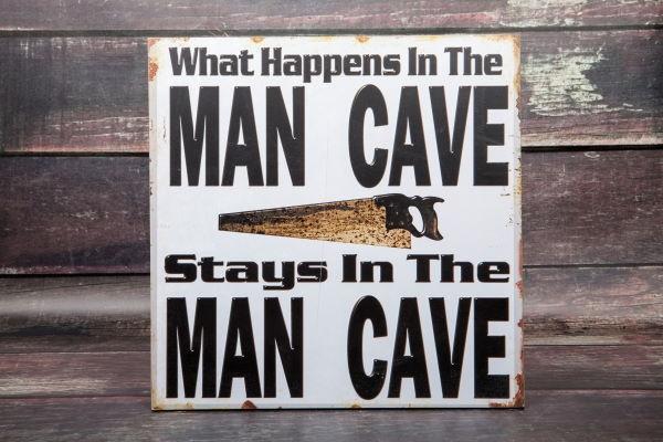 Sign that says: "What happens in the man cave stays in the man cave"