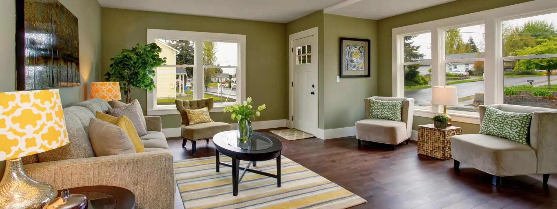 Living room painted in earthy green color