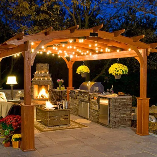 pergola with outdoor kitchen, and fireplace